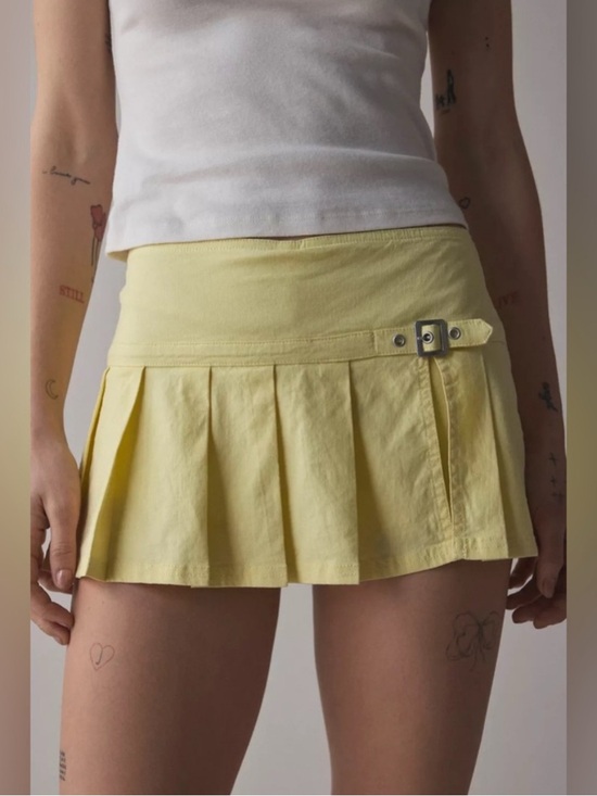 BDG Dresses & Skirts - BDG Pale Yellow Pleated Mini Skirt with Side Buckle